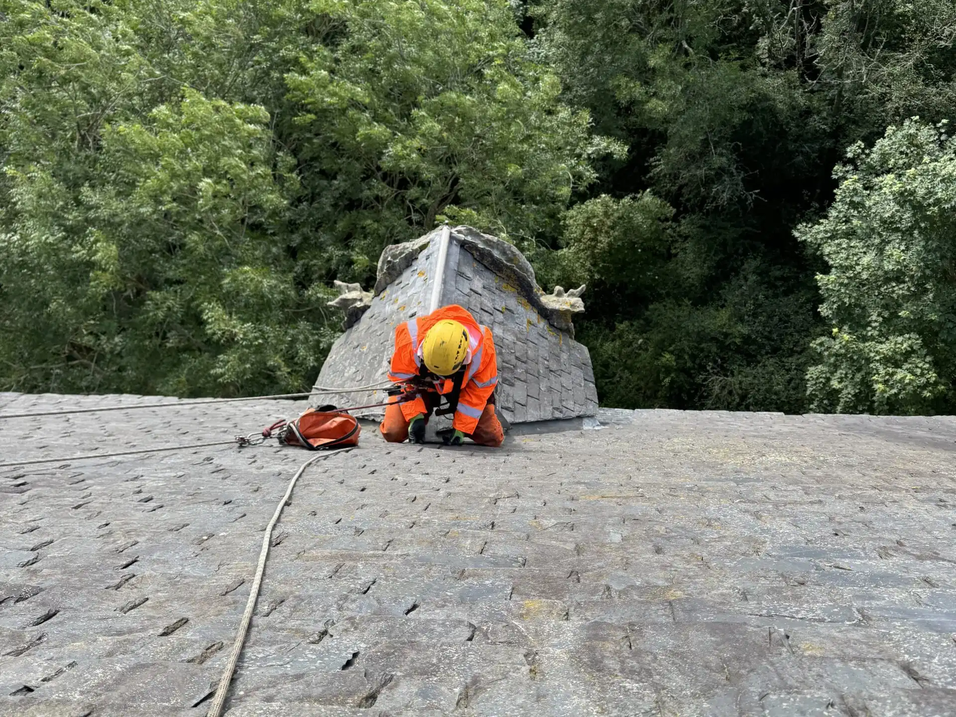 Rope access roof repairs tenement roof repair